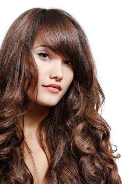 Layers transform thick wavy hair into a full-bodied and high glamour ...