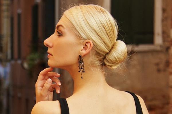 low bun is a chic and sophisticated cocktail party hairstyle that ...